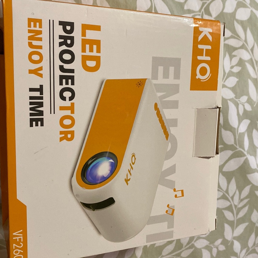 This projector is white and yellow  VF260 screen size 22-170ft